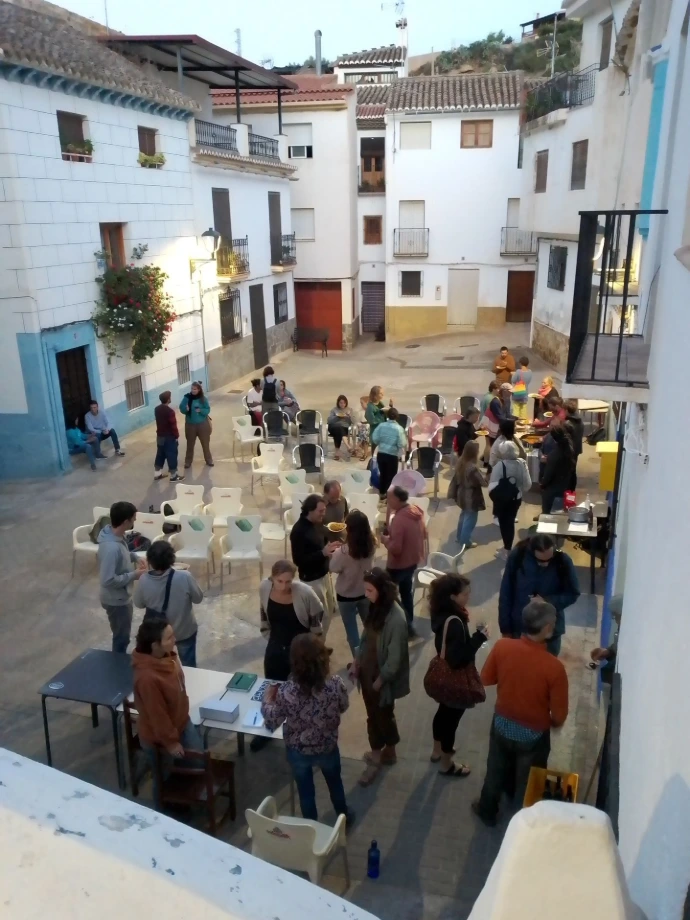 Group of people gathered outdoors — A diverse group of participants gathered outdoors during a WellSpaces network activity.